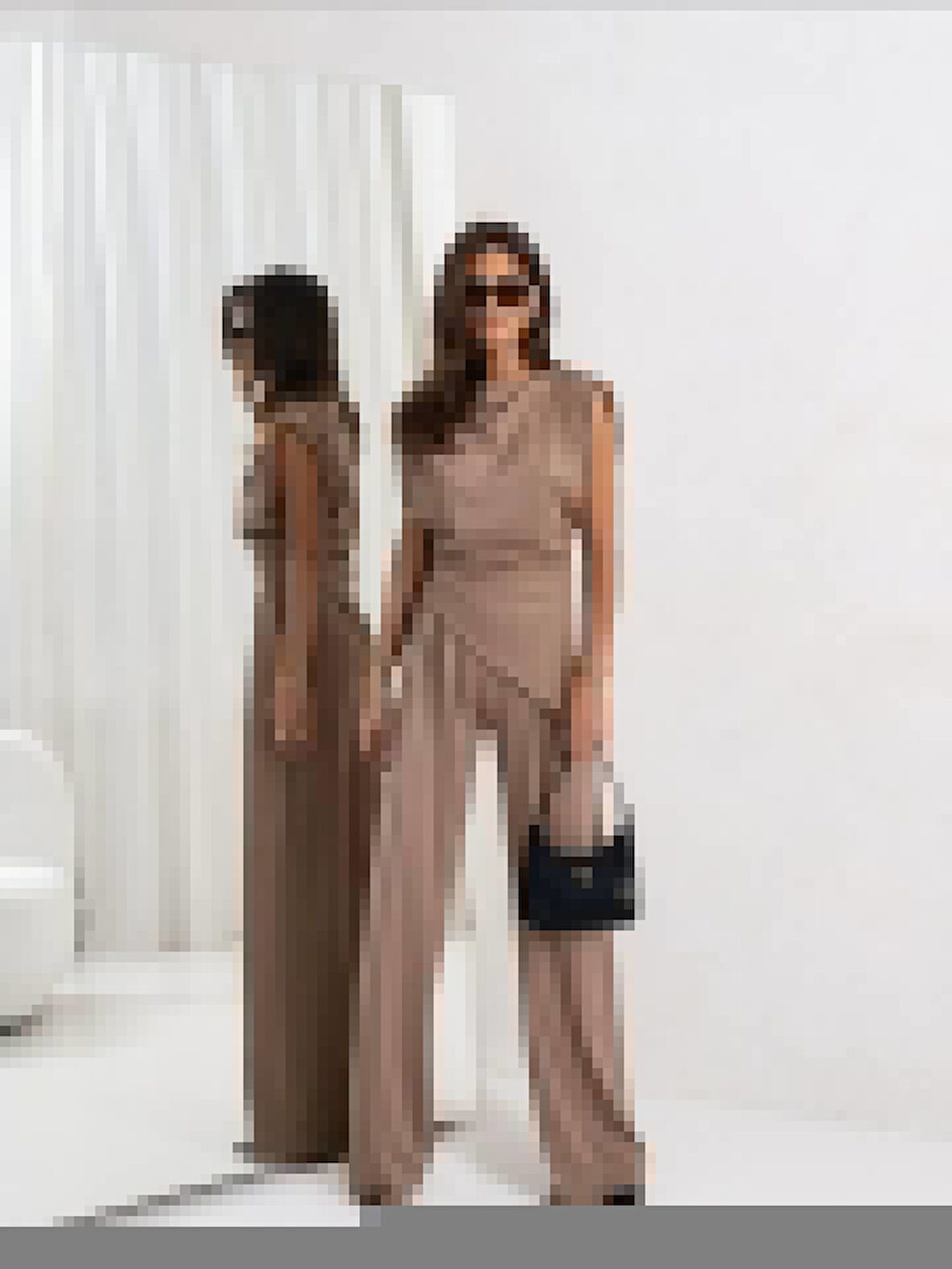 Kadın Dalgıç Kumaş Sıfır Kol Bluz Ve Bol Kesim Pantolon Ikili Takım