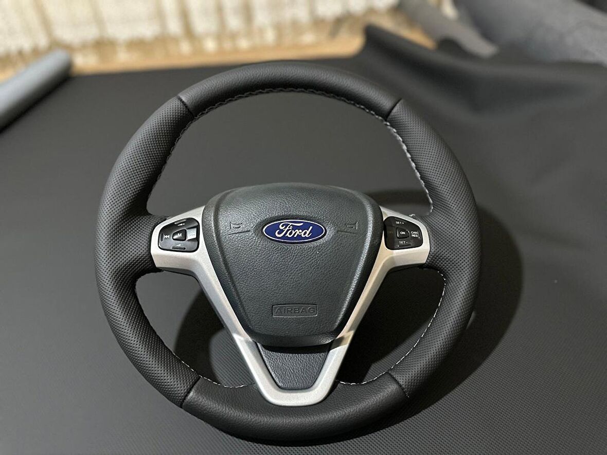 FORD FİESTA ARACA ÖZEL DİKMELİ DİREKSİYON KILIFI(FABRİKASYON DERİSİZ PLASTİK DİREKSİYON)