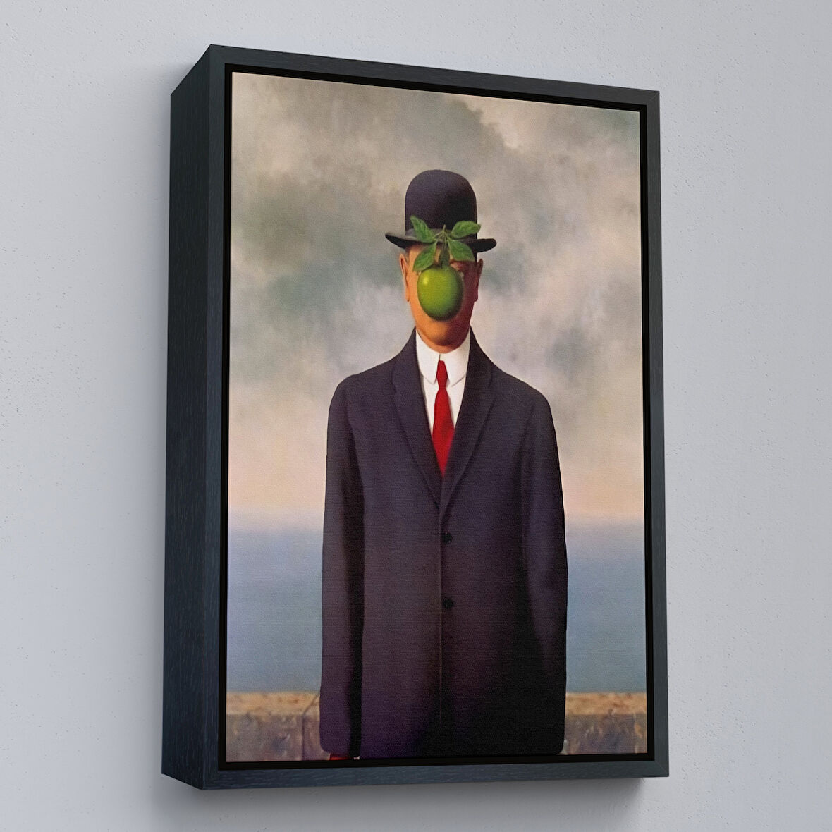 Siyah Çerçeveli Renee Magritte'in Adamın Oğlu İsimli Eseri Kanvas Tablo