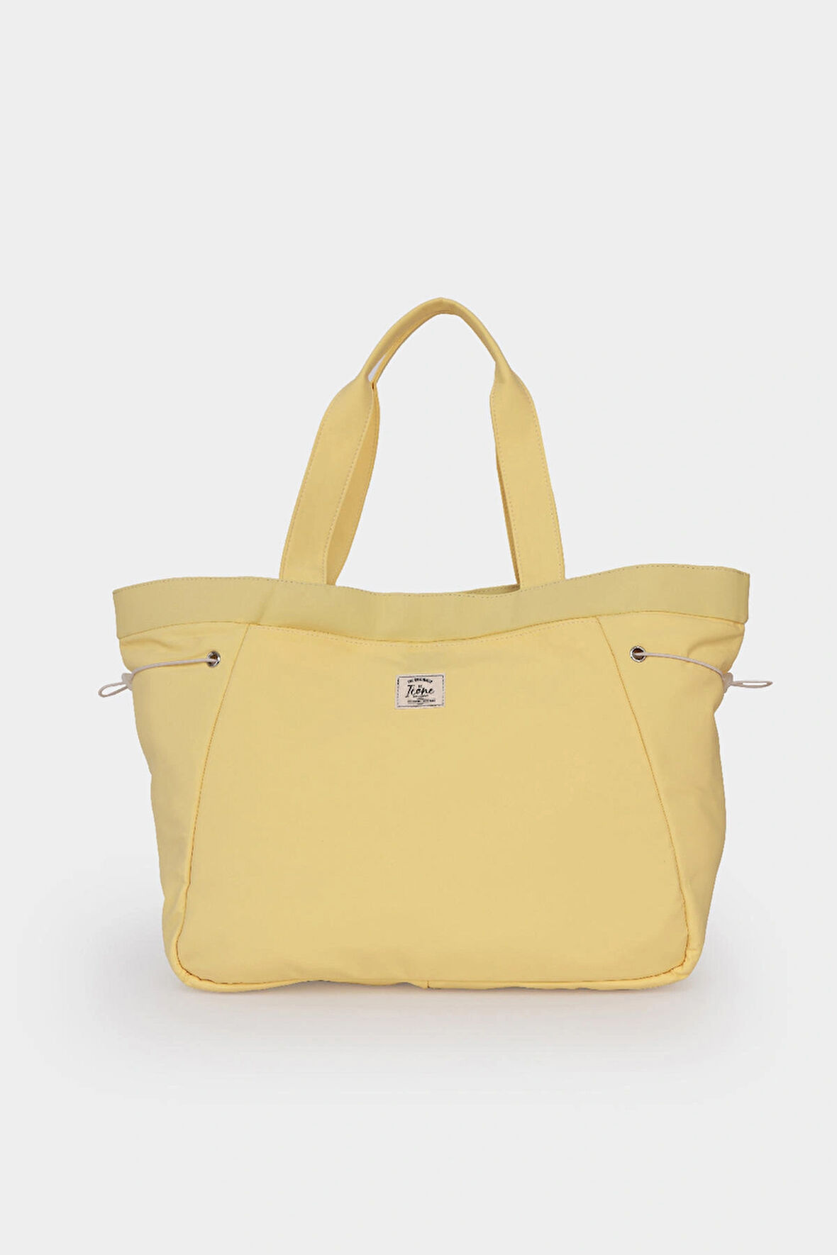 İnce Paraşüt Kumaştan, Yanları Lastikli Büzülebilen, Önde Büyük Cepli Kadın Çanta