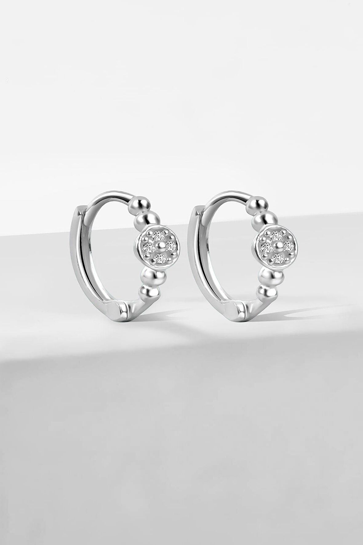 Gümüş 1.3 cm zirkon taşlı toplu küpe