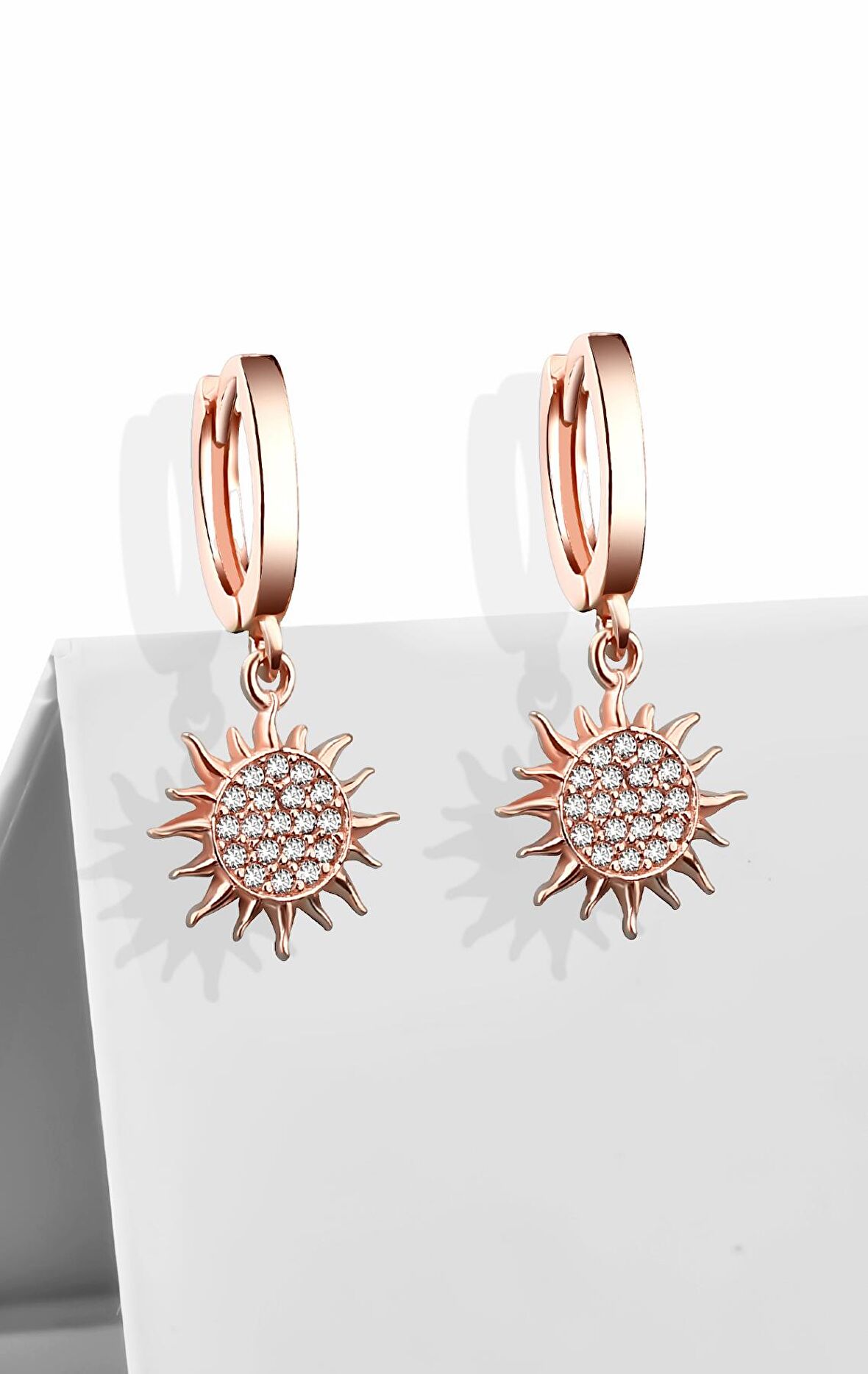 Gümüş zirkon taşlı güneş model sallantılı rose küpe