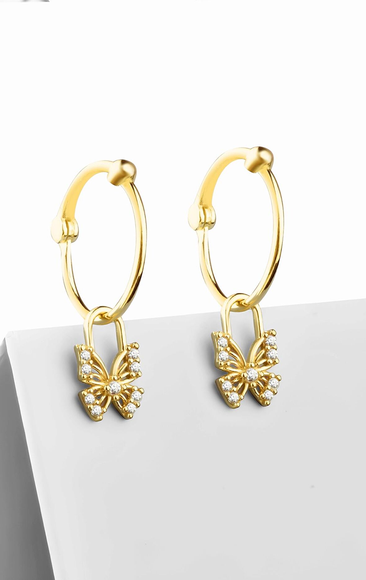 Gümüş zirkon taşlı kelebek model sallantılı gold küpe