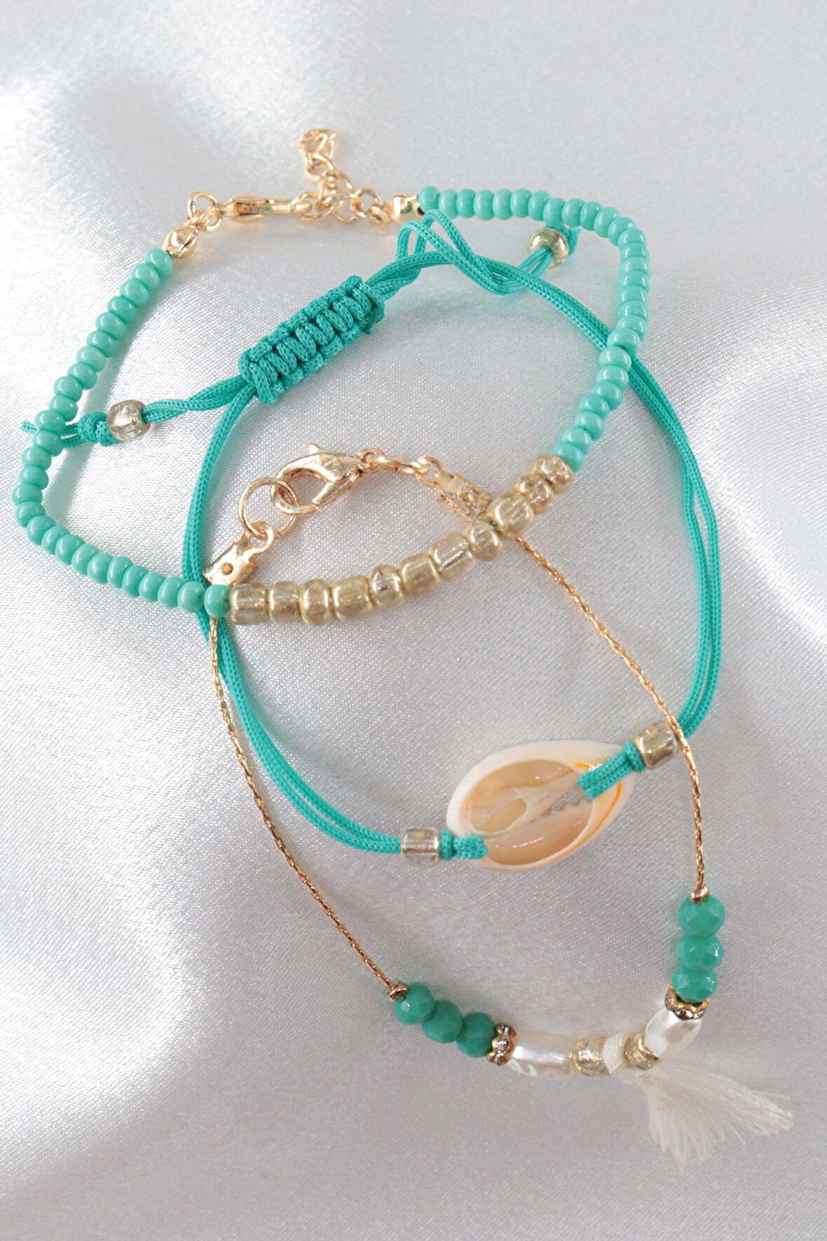 3lü deniz kabuklu incili püsküllü asansörlü lastikli turkuaz ip bileklik. Kadın ip bileklik halhal