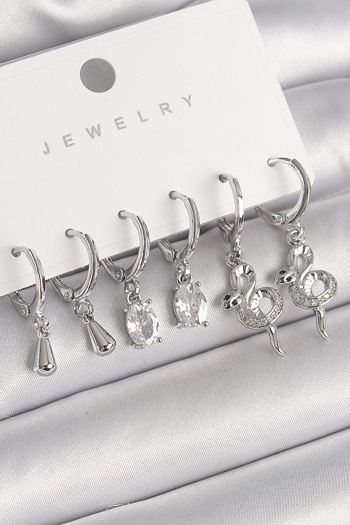 MuI MuI Pirinç Gümüş Renk Sallantı Zirkon Taşlı Yılan Model Kadın Küpe Seti