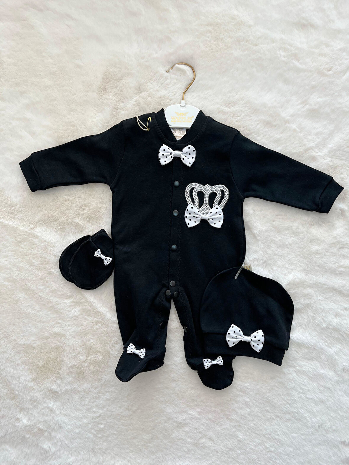 Siyah fiyonklu Tulum