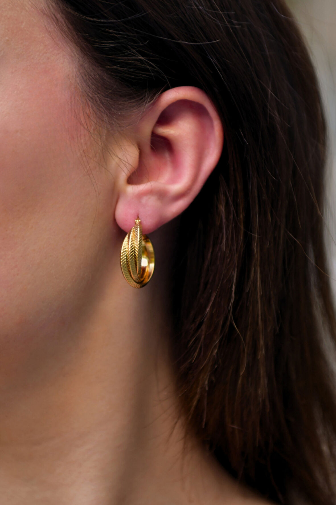 Desenli Oturtmalı Sarmal Model Çiftli Kadın Çelik Halka Küpe