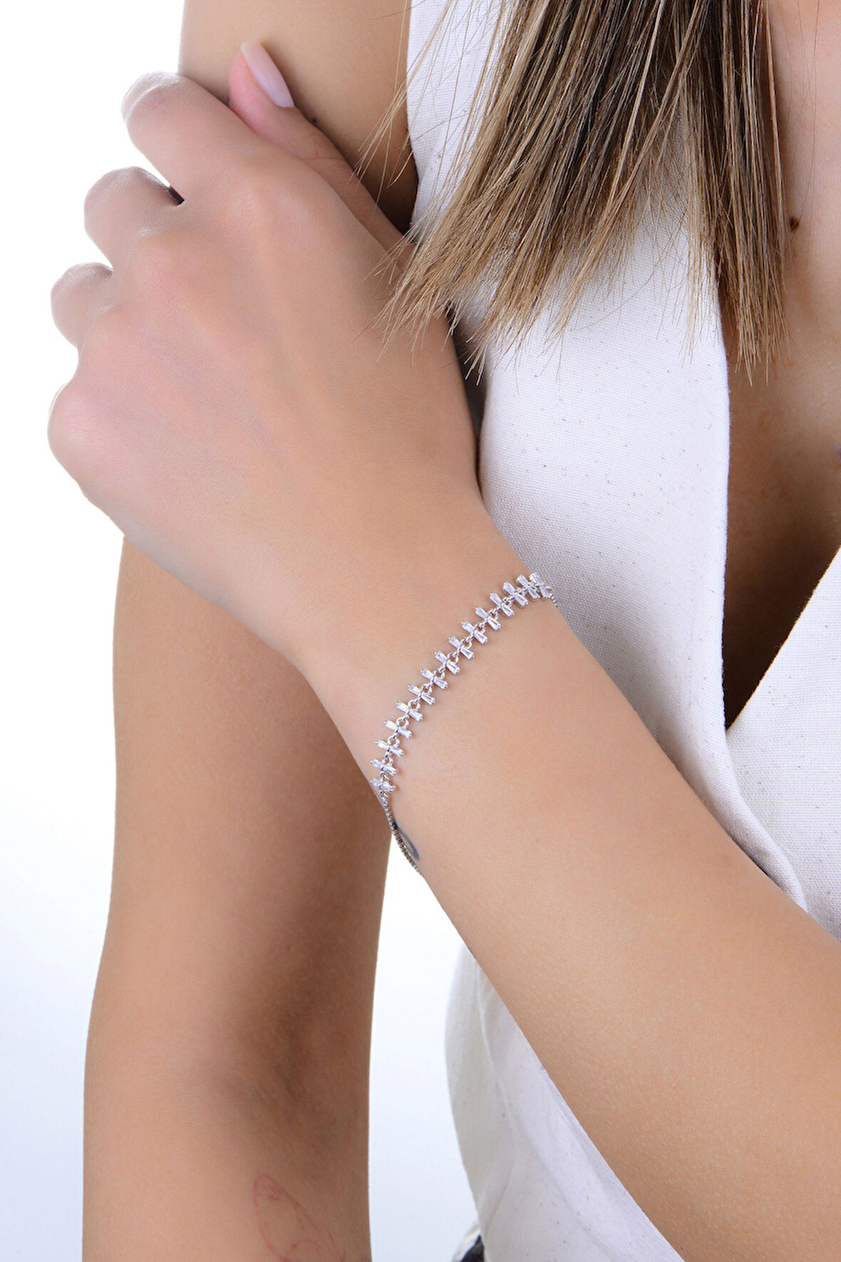 Gümüş rodyumlu baget kesim zirkon taşlı hareketli kırkayak model bileklik SGTL12914RODAJ