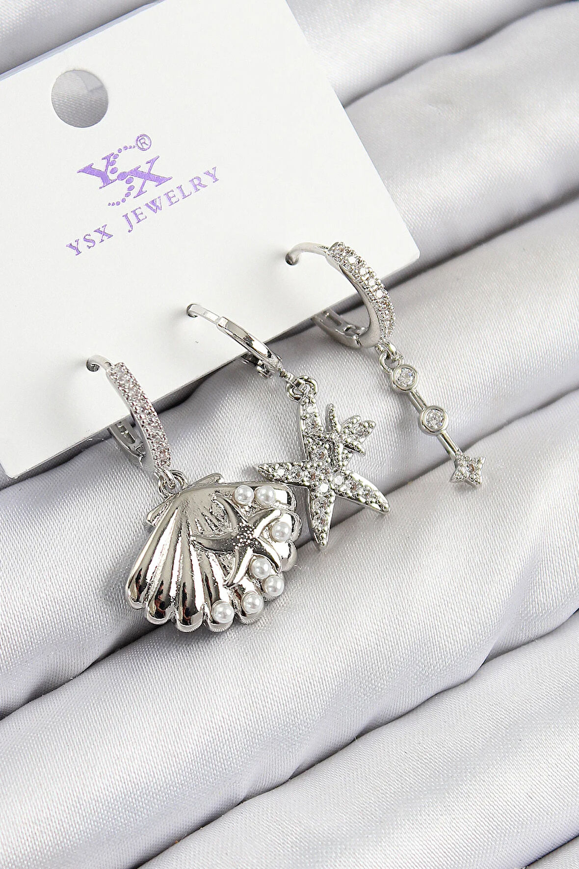 Tegan Pirinç Zirkon Taşlı 3'lü Yıldız Ve İstiridye Model Gümüş Renk Kadın Küpe TG27BKP11131