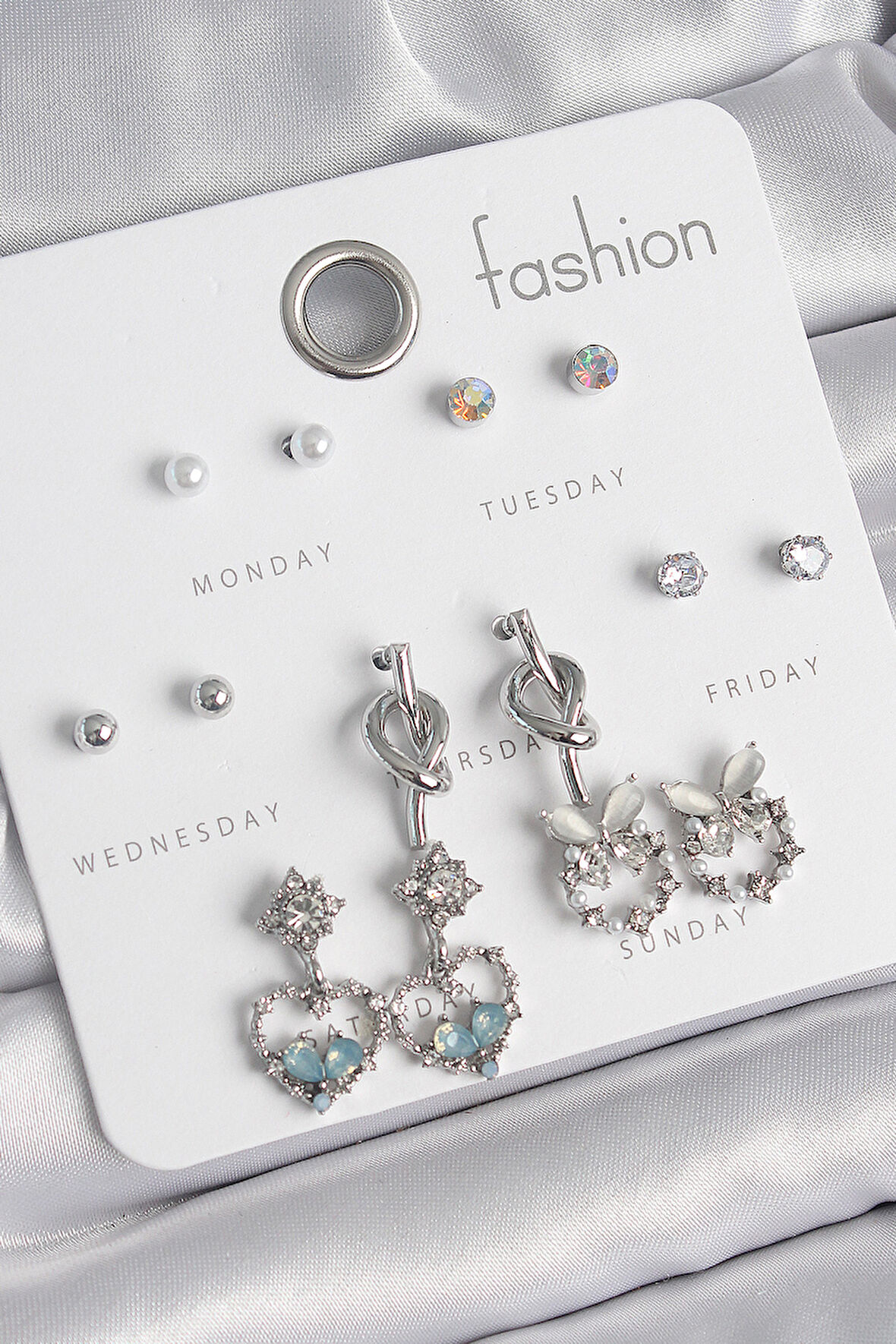 Pirinç Gümüş Renk Sallantı Zirkon Taşlı Kalp Model Düğüm Detay 7 Çift Kadın Küpe Seti - TJ-BKP10548