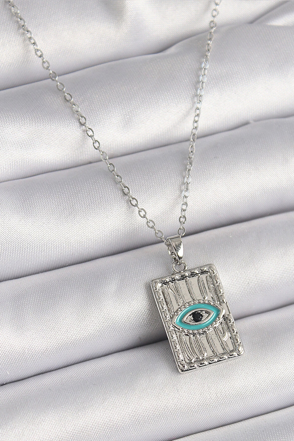 316L Çelik Gümüş Renk Zirkon Taşlı Göz İşleme Detaylı Plaka Model Kadın Kolye