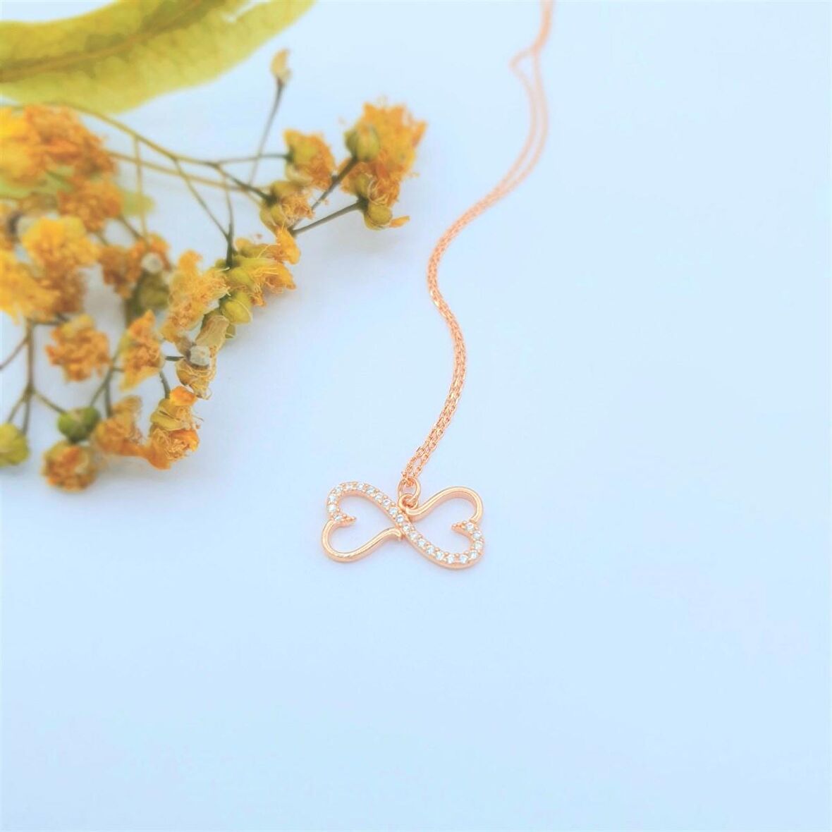 ZİRCON TAŞLI ROSE RENK SARMAŞIK SONSUZLUK GÜMÜŞ KOLYE