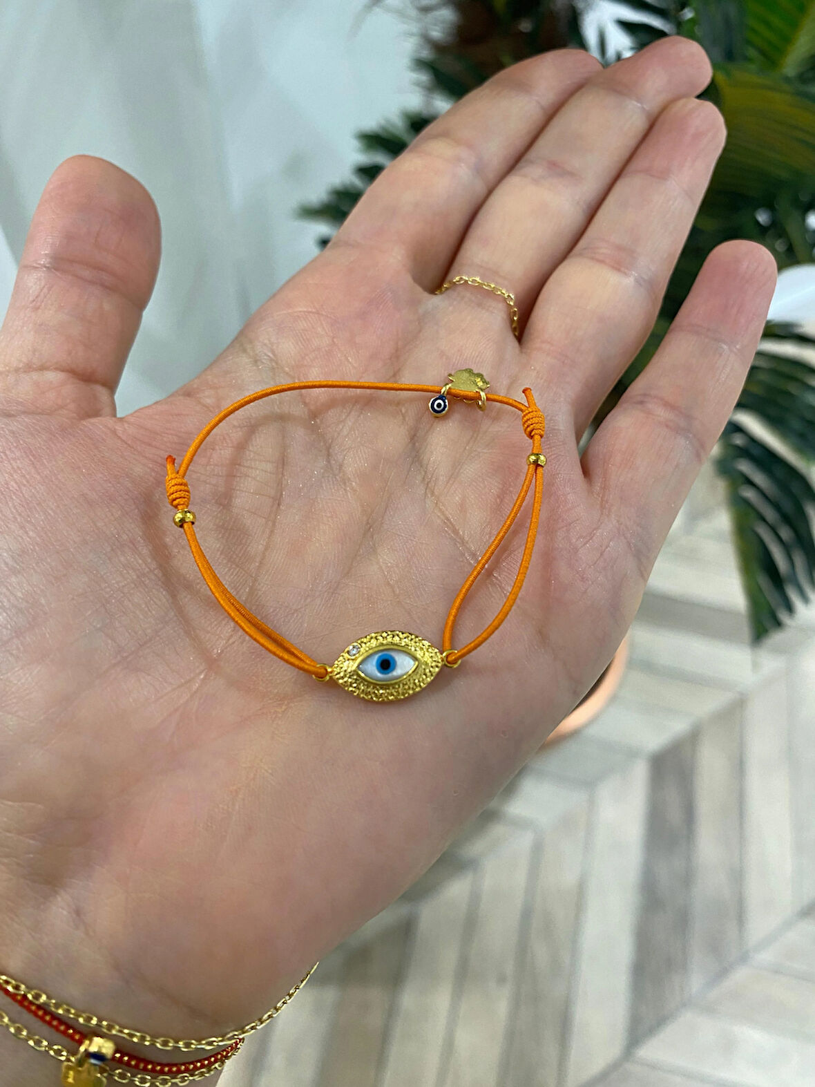 Kadın Gümüş Turuncu İpli Göz Bileklik