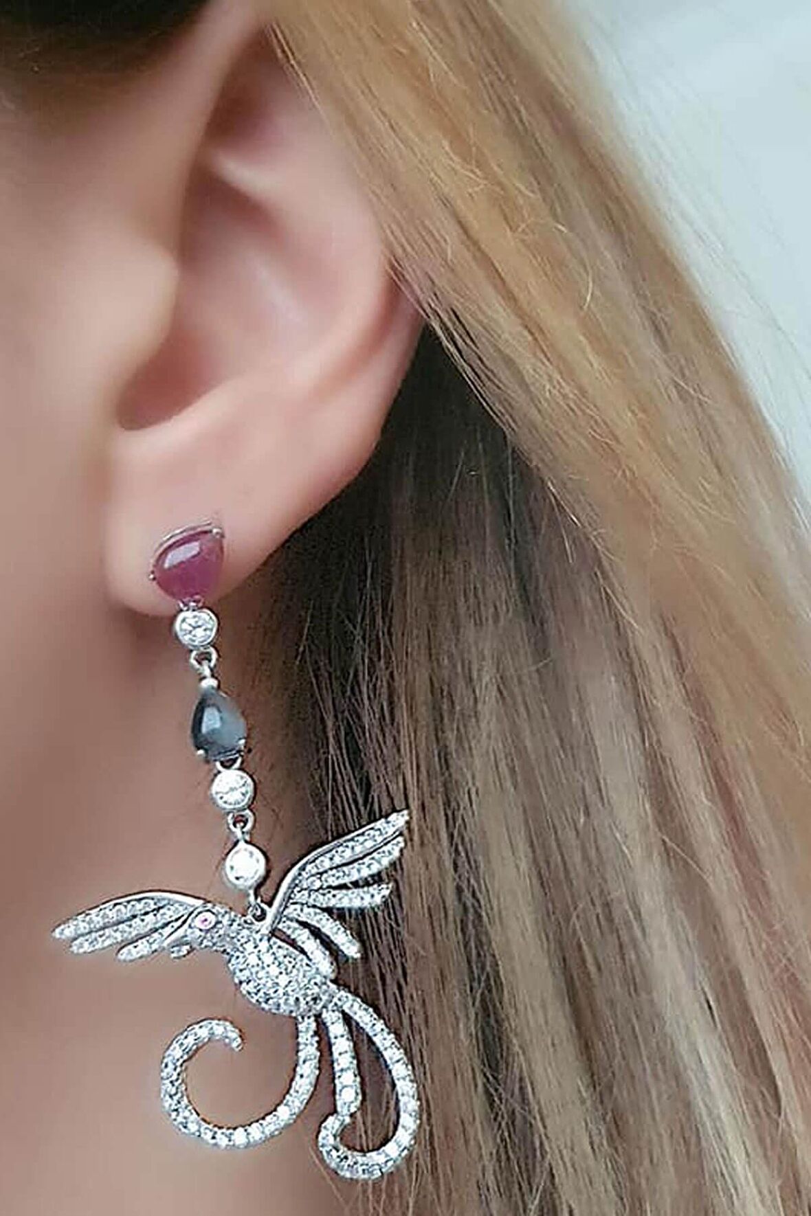 Pırlanta ışıltısında zirkon taşlı gümüş anka kuşu lüks küpe