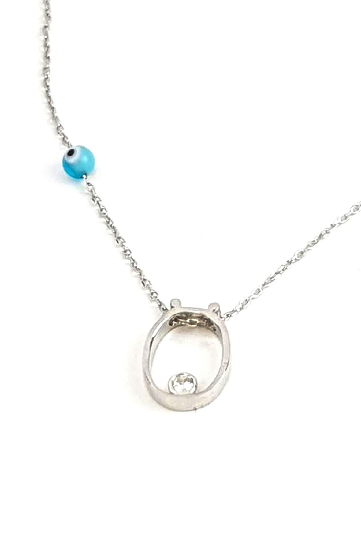 Nazar boncuklu ve zirkon taş detaylı gümüş ö harfi kolye