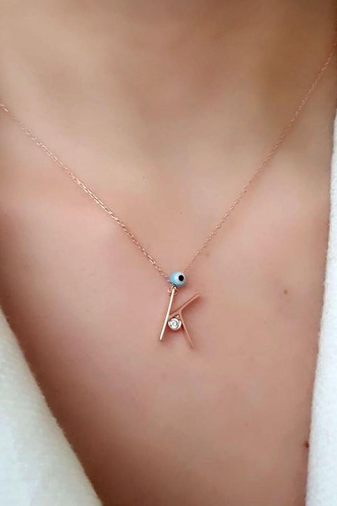 Nazar boncuklu ve zirkon taş detaylı gümüş rose k harfi  kolye 