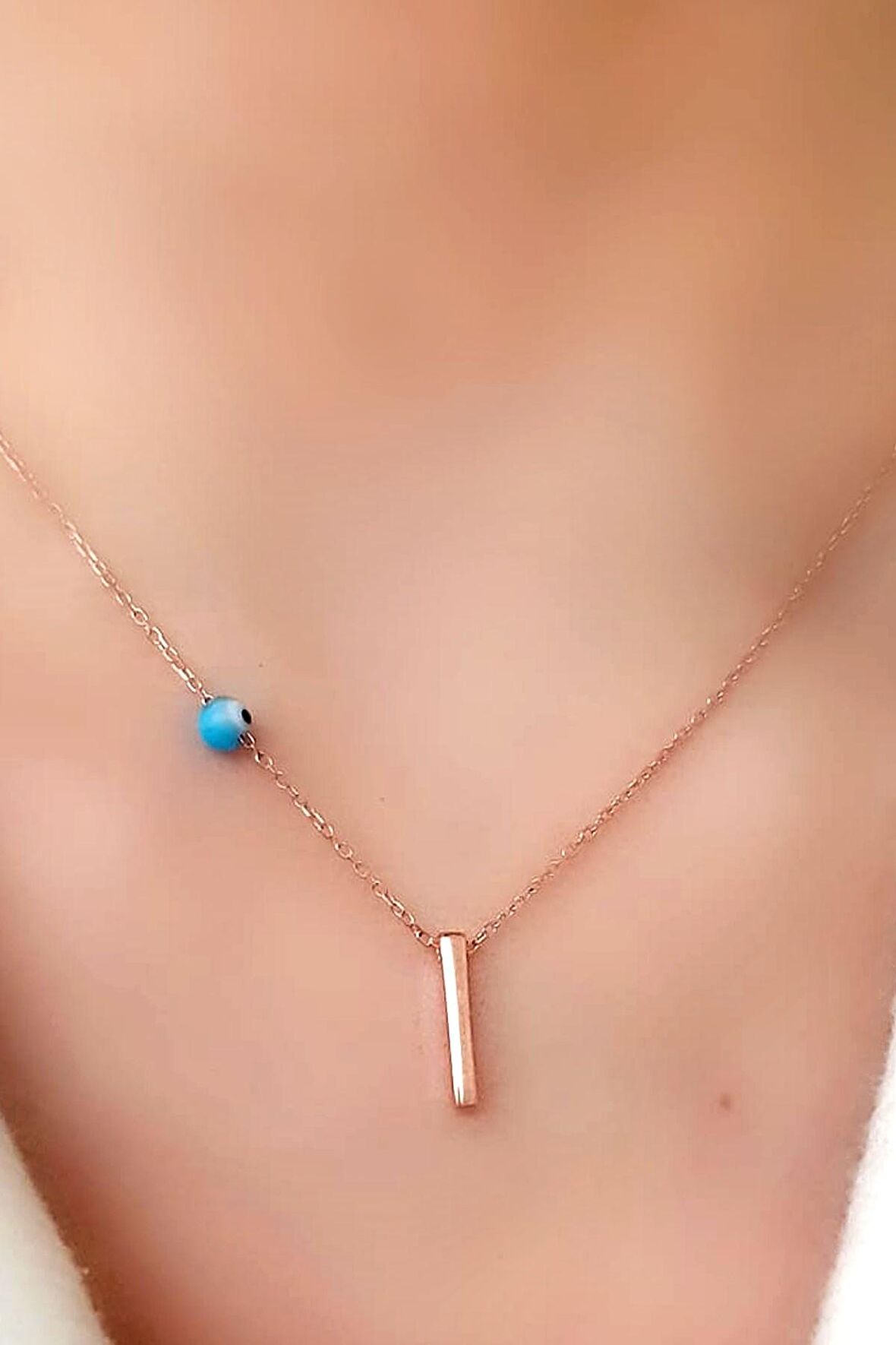 Nazar boncuklu ve zirkon taş detaylı gümüş rose I harfi  kolye