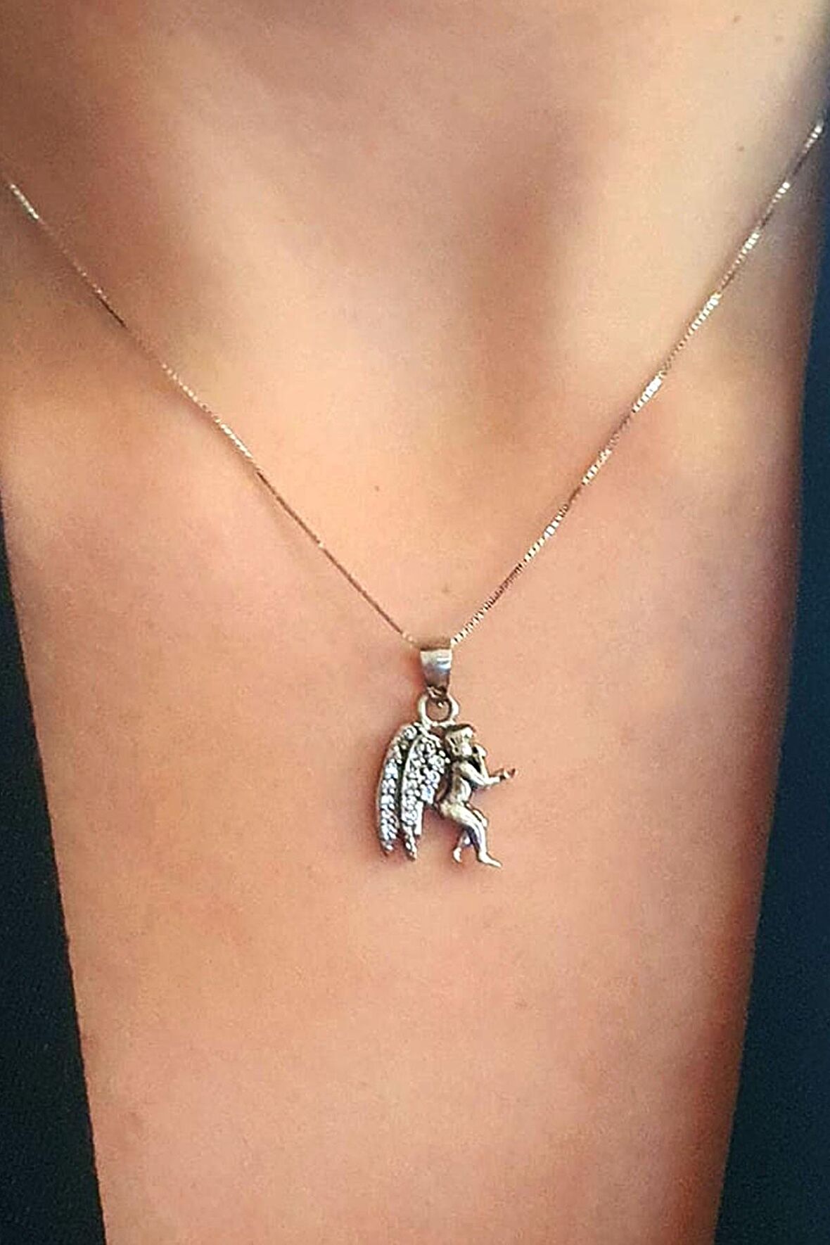 Melek figürlü gümüş kolye 