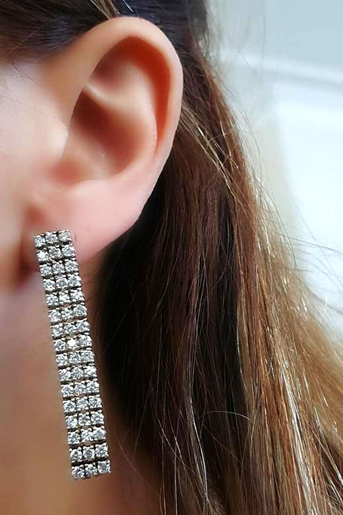 Pırlanta ışıltısında zirkon taşlı gümüş lüks küpe 