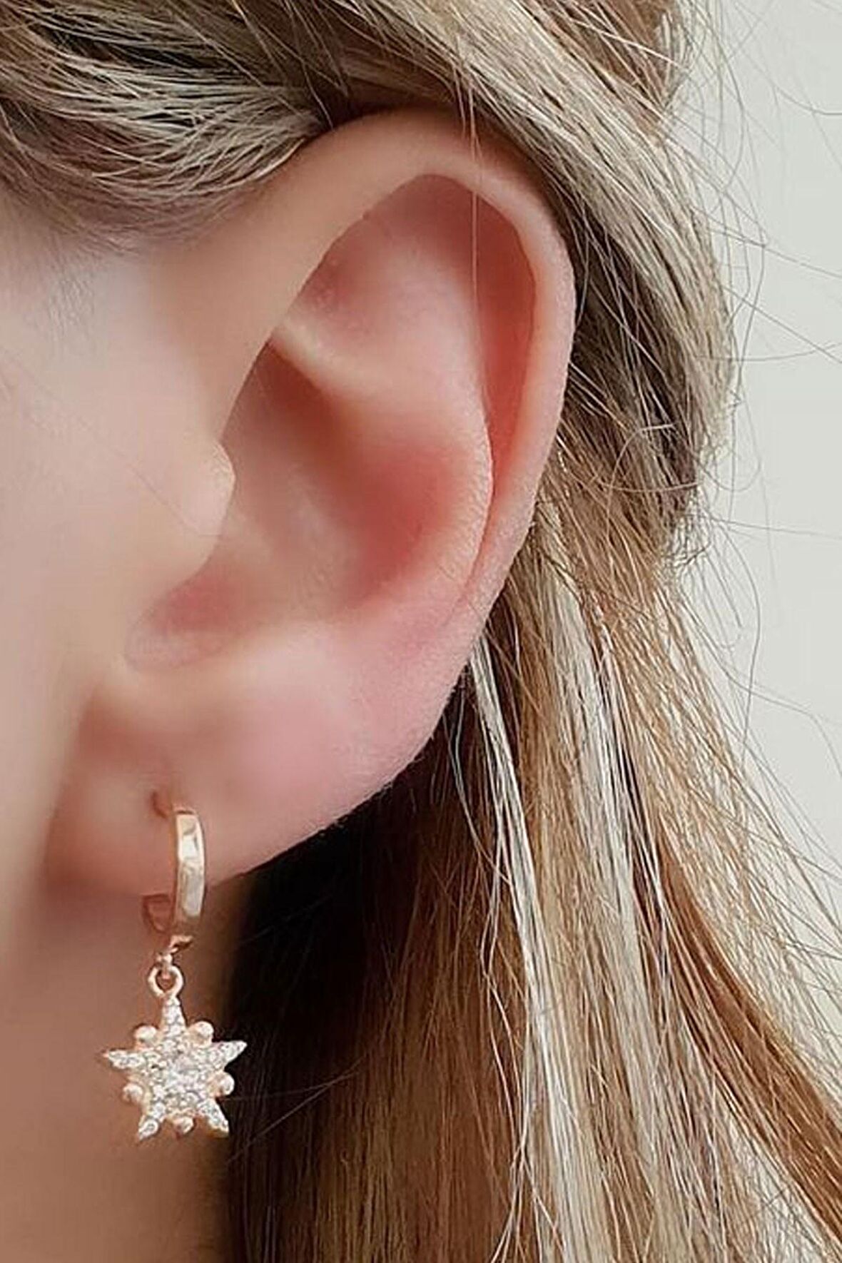 Zirkon taşlı 925 ayar gümüş rose kutup yıldızı sallantılı küpe