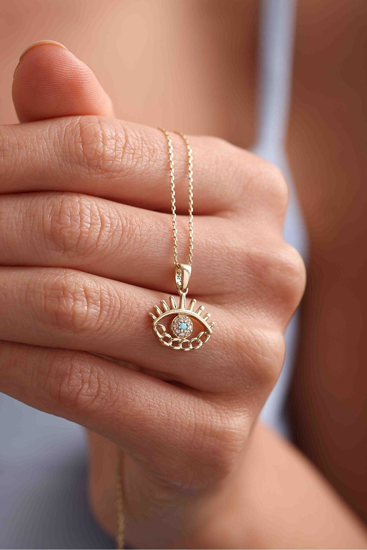 Zincir Detaylı Mavi Beyaz Taşlı Kirpikli Göz Kolye