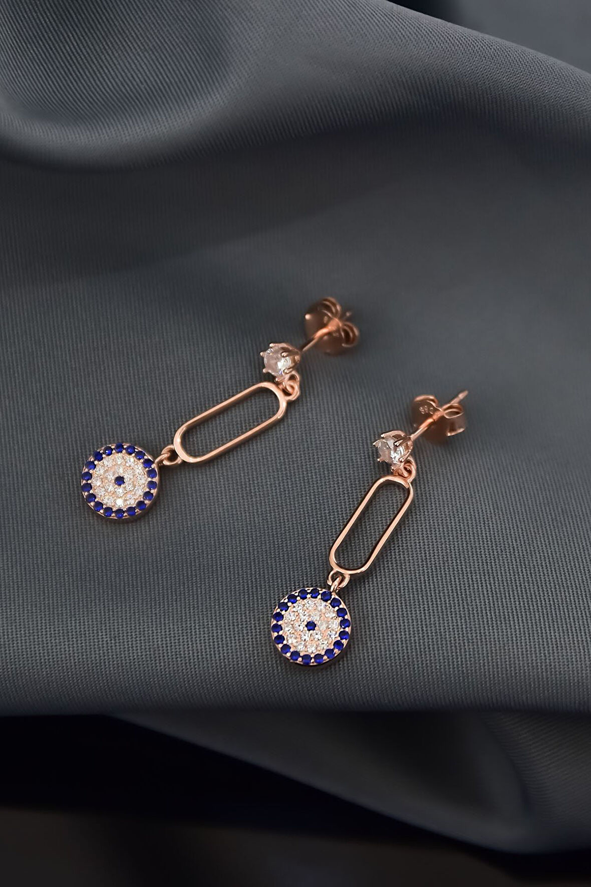 925 Ayar Gümüş Rose Kaplama Zirkon Taşlı Tek Taş Sallantılı Kutup Nazar Küpe