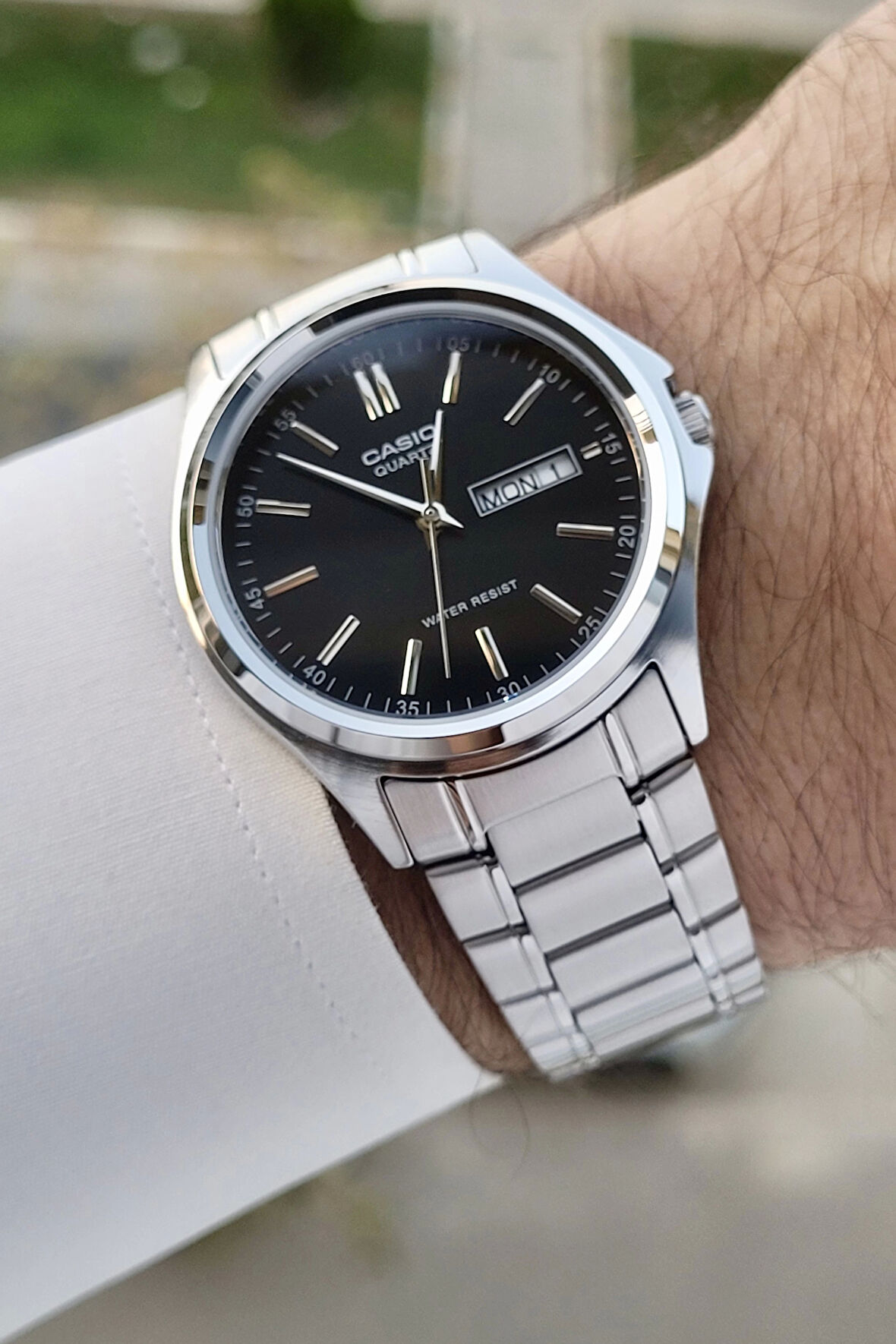 Casio CSISTE94 Kadranı Siyah Kordonu Gümüş Renk Gün ve Takvim Fonksiyonlu Hediye Paketli Erkek Kol Saati