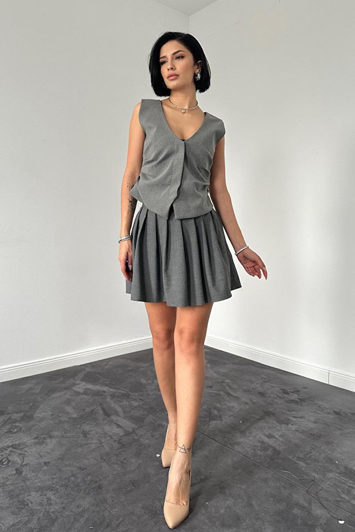 Yonca Moda Evi Gri Pilikaşe Mini Etek