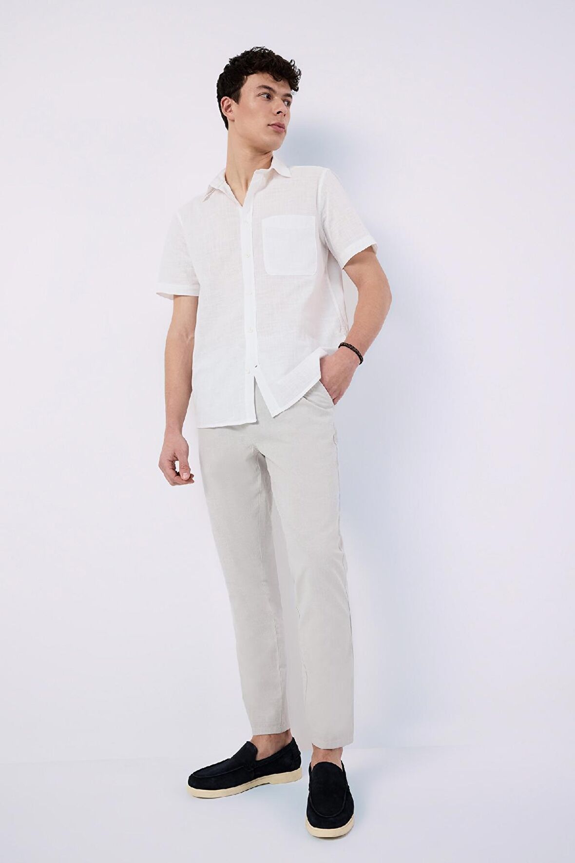 DeFacto %100 Pamuk Keten Görünümlü Yazlık Jogger Pantolon Dar Paça Beli Bağcıklı Lastikli Cepli Z6475AZ25SPGR94