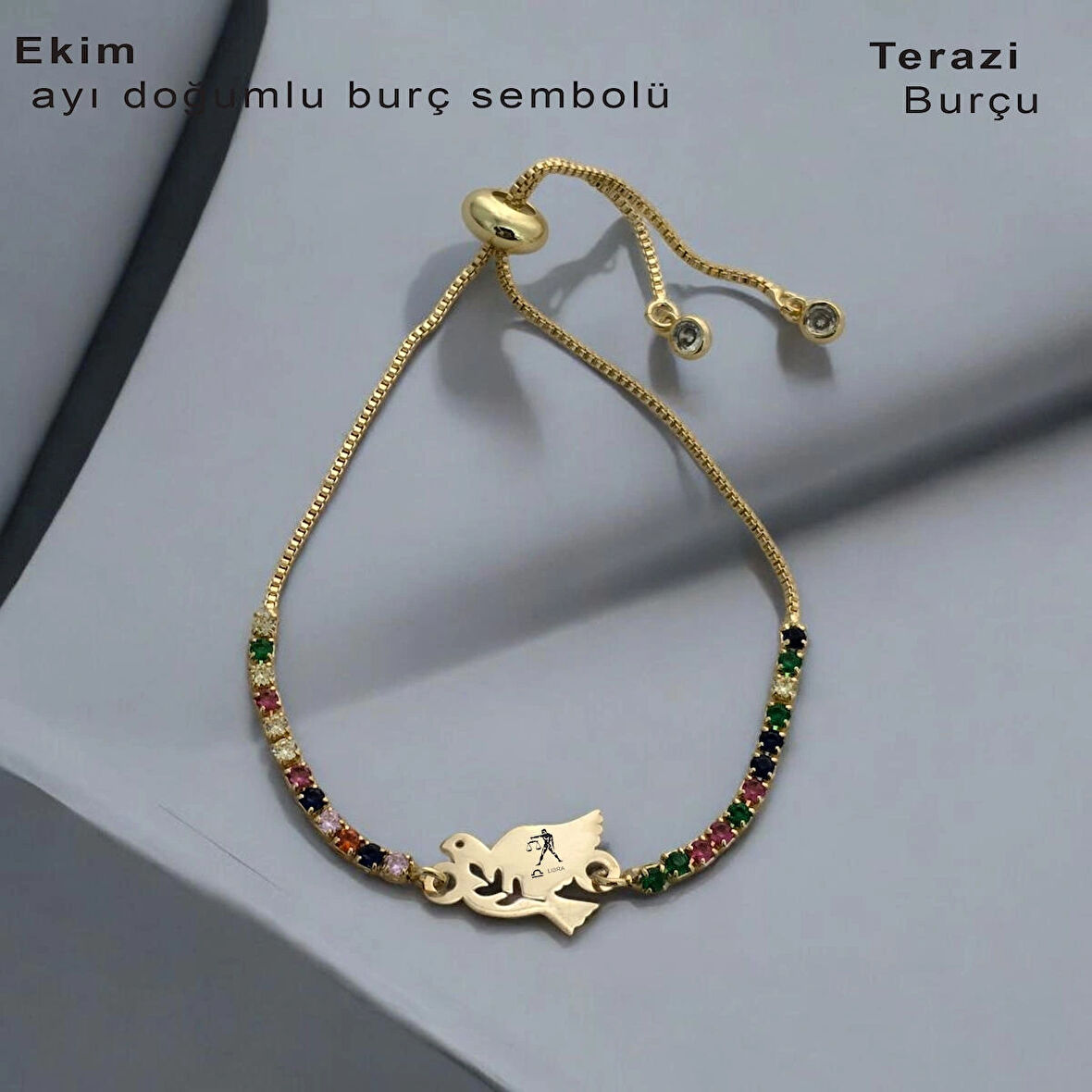 Değişimin ve yenilenmenin ayı, Zarif Kuş Figürlü, 14 Ayar Altın Plakalı ve Işıltılı Renkli Taşlı Ekim Bilekliği