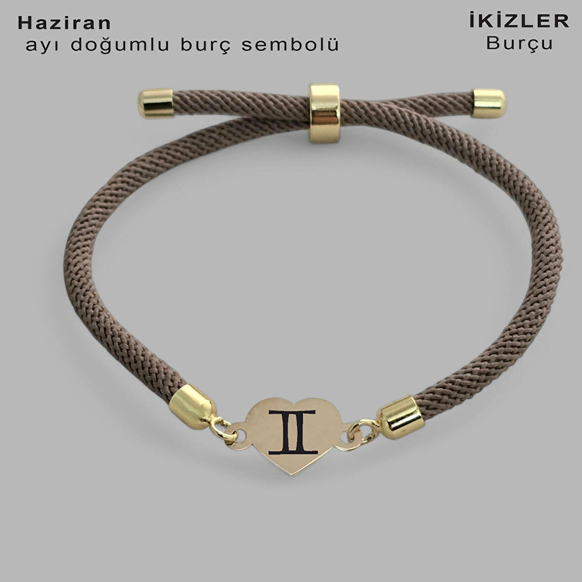 Yazın Enerjisini Yansıtan Kalp Figürlü ve Kahverengi Örgülü 14 Ayar Altın Plakalı Haziran Bilekliği