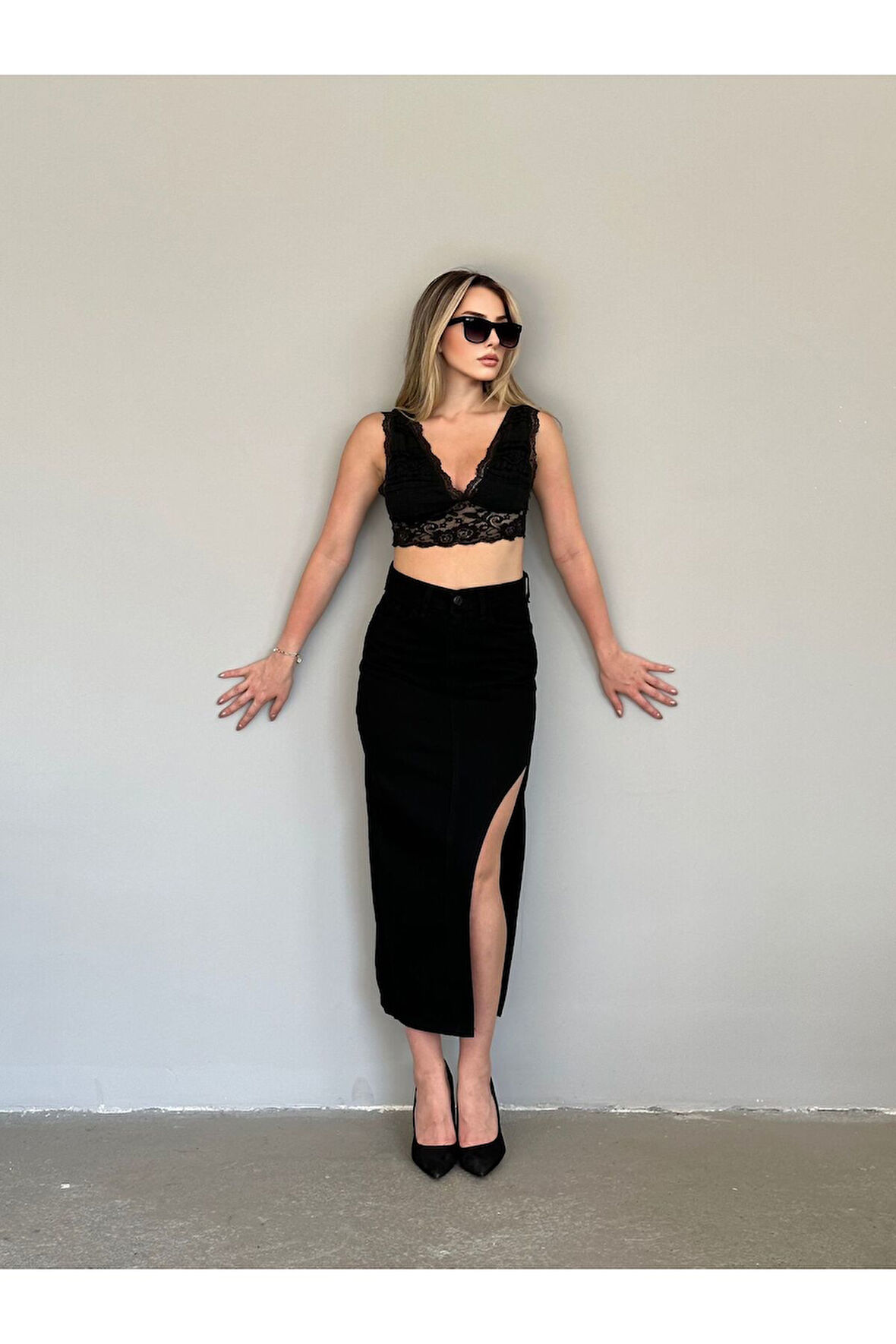 KADIN SİYAH UZUN ÖN PARÇALI  ASİMETRİK KOT ETEK