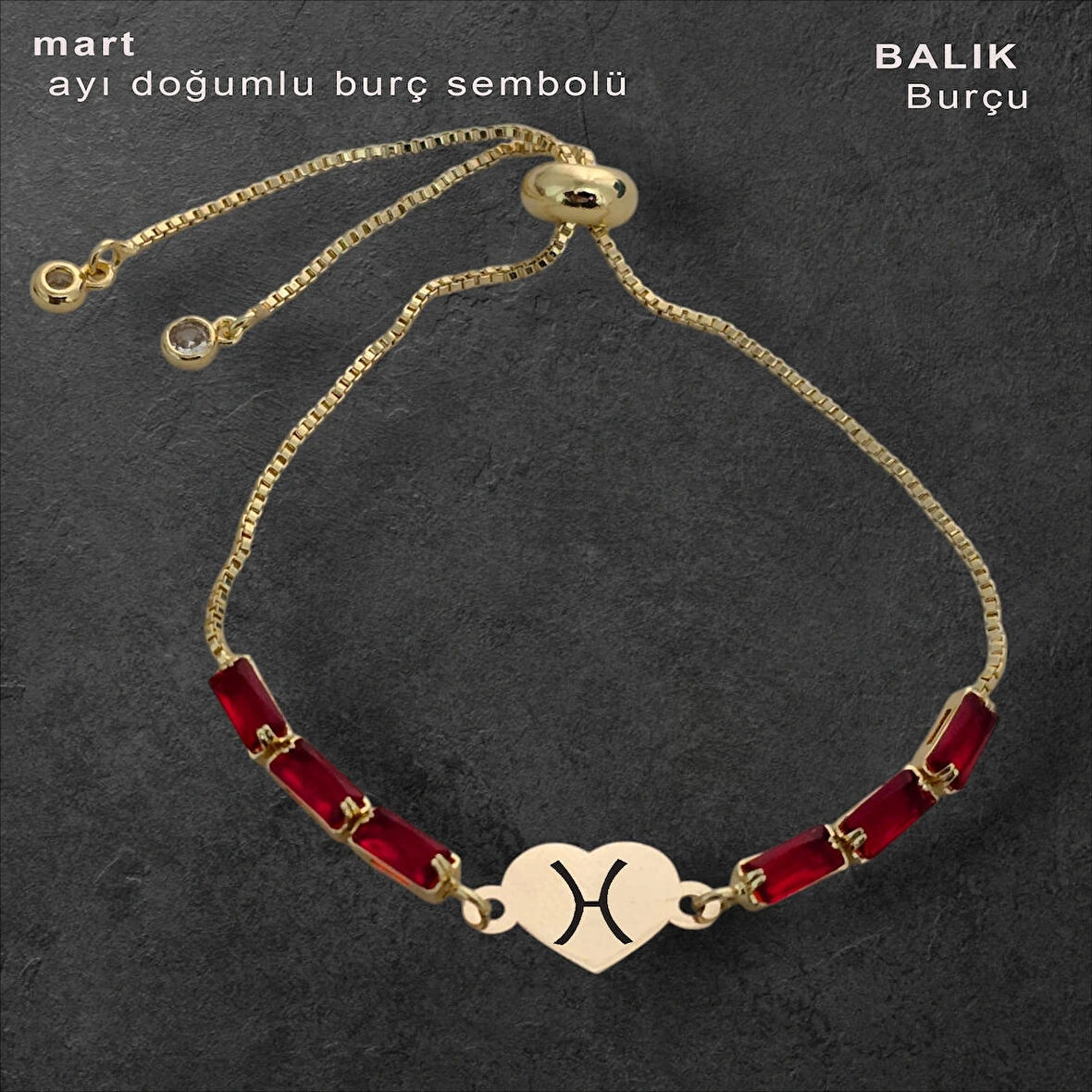 Baharın Canlanışını İfade Eden Kalp Motifli Kırmızı Taşlı 14 Ayar Altın Plakalı Mart Bilekliği