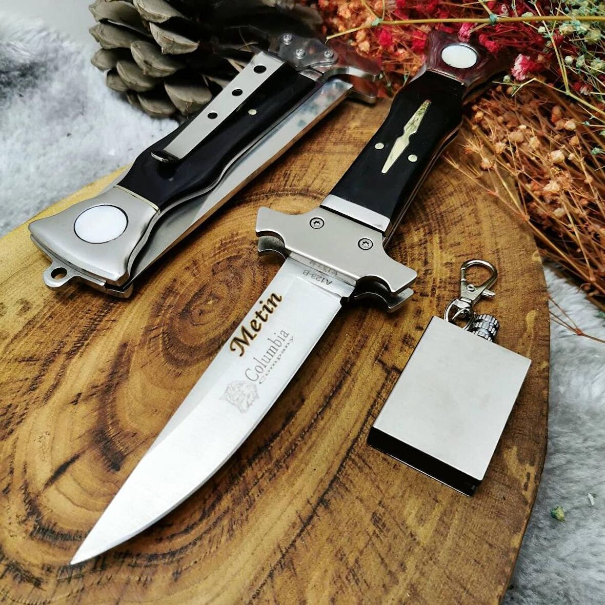 22 cm komple çelik manuel kabze emniyetli orjinal columbia kılıflı bıçak yanında zippo kibrit ile birlikte