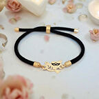 Gizemli ve Çarpıcı Siyah Örgü Desenli 14 Ayar Altın Plakalı ve Kuş Figürlü Bal Maske Bilekliği