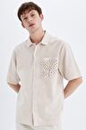 DeFacto Relax Fit Yazlık Polo Yaka Pamuklu Kısa Kollu Cepli Gömlek C7556AX24SMBG750