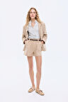 Süet Görünümlü Kemer Aksesuarlı Mini Şort Bej