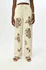 KADIN BELİ LASTİKLİ BOL PAÇA NAKIŞLI VE İNCİ İŞLEMELİ PANTOLON