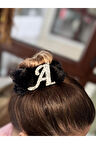 A harfli kürklü saç tokası