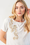 Ekru Yuvarlak Yaka Kısa Kollu Ön Altın Yaprak Desenli Bluz
