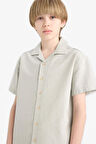 DeFacto Erkek Çocuk Oversize Geniş Kalıp Polo Yaka Müslin Kısa Kollu Gömlek E3314A825HSGN1123