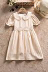 Krem Dantel İşlemeli Kuşaklı Kız Çocuk Müslin Elbise  22659