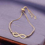 Özgün Sonsuzluk Kelebek ve Beyaz Taşlı 14 Ayar Altın Plakalı Cansu Bilekliği