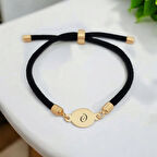 Özel ve Zarif 14 Ayar Altın Plakalı ve Siyah Örgülü Yuvarlak Motifli Ö Harfi Bilekliği