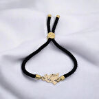 Etkileyici Bir Dokunuş İçeren Kuş Motifli Siyah Örgülü ve 14 Ayar Altın Plakalı Pelin Bilekliği