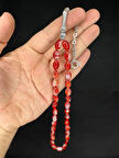 TOZ KEHRİBAR TESBİH KIRMIZI RENKLİ BEYZİ KESİM 10MMX6,5MM T-679