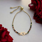 Modern Çizgili Kalp Figürlü ve Renkli Taş Desenli 14 Ayar Altın Plakalı X Harfli Bileklik