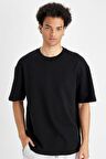 DeFacto %100 Pamuk Relax Fit Bisiklet Yaka Kısa Kollu Basic Düz Siyah Tişört D3673AX24AUBK81