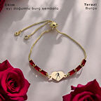 Değişimin ve Yenilenmenin Ayı Kalp Motifli Kırmızı Taşlı 14 Ayar Altın Plakalı Ekim Bilekliği