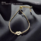 Değişimin ve Yeniliğin Işıltısı Kalp Motifli Beyaz Taşlı 14 Ayar Altın Plakalı Ekim Bilekliği